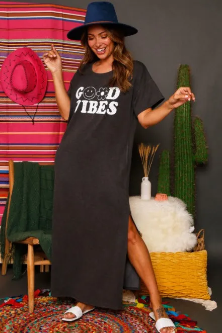 Women's solid dark grey maxi dress with side pockets and "Good Vibes" print